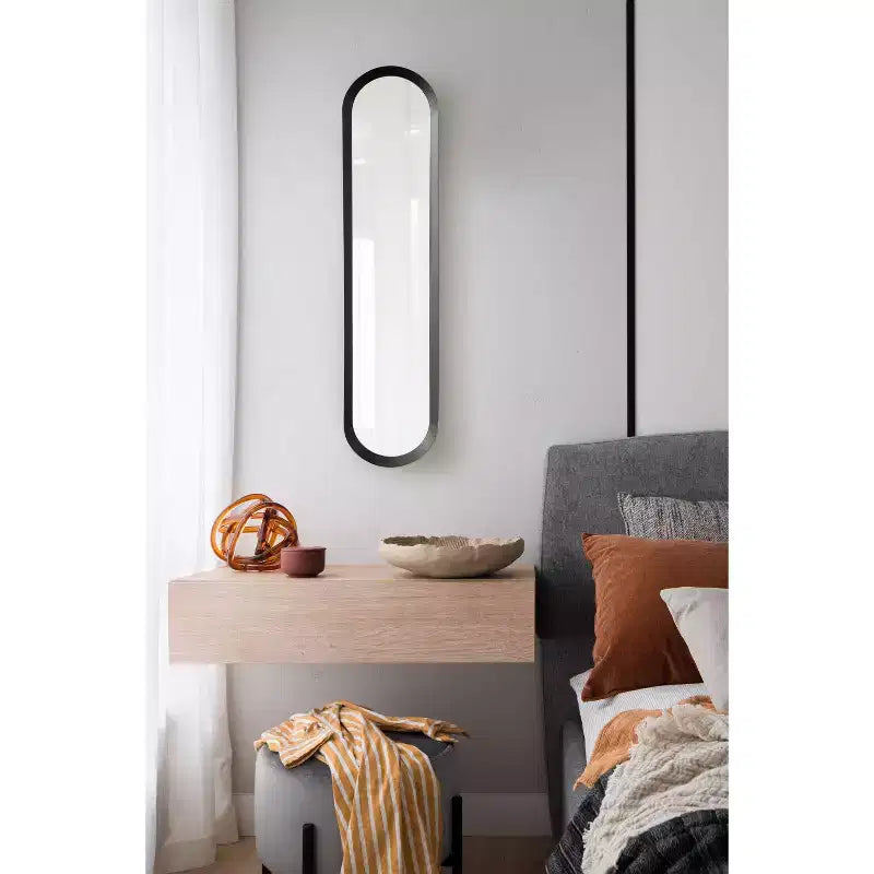 Kate & Laurel All Things Decor Espejo de pared de panel de metal Niya de 10"x40" negro