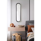 Kate & Laurel All Things Decor Espejo de pared de panel de metal Niya de 10"x40" negro