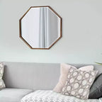 Espejo de pared y decorativo octogonal Bastian de 28"x28" de Howard Elliott: oro antiguo, marco de hierro, listo para colgar