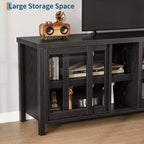 Mueble de TV Garvee para 65 pulgadas, centro de entretenimiento con armario de almacenamiento y 4 puertas correderas de cristal, mesa consola para salón dormitorio