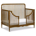 Cuna convertible 4 en 1 Liberty de Namesake con husos