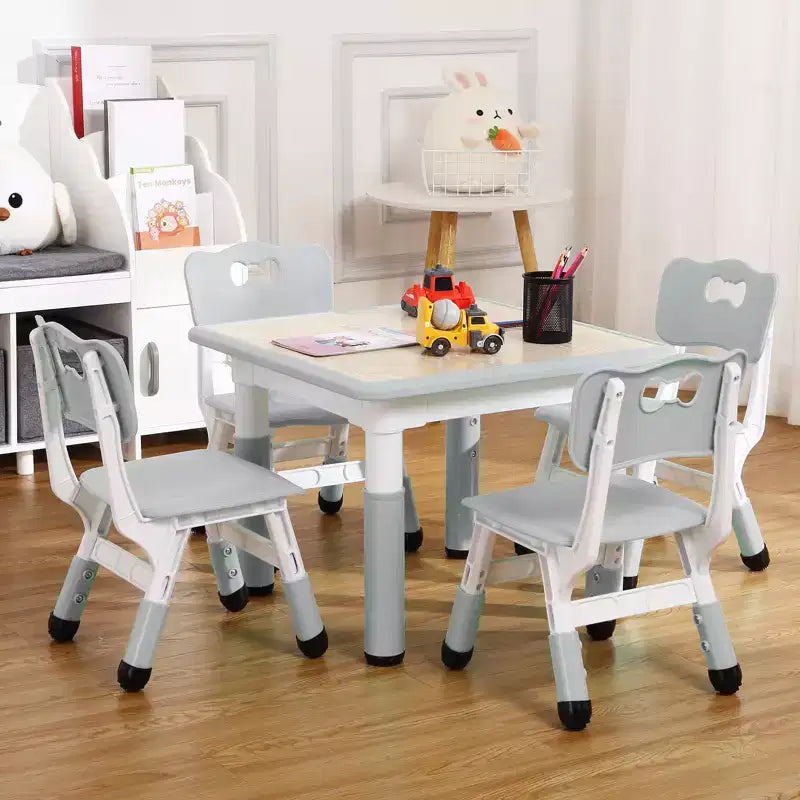 Mesa y 4 Sillas Modernas para Niños, Mesa para Niños Pequeños Ajustable en Altura 23 y 4 Sillas con Patas Antideslizantes y Escritorio con Graffiti Organizador