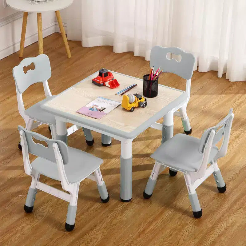 Mesa y 4 Sillas Modernas para Niños, Mesa para Niños Pequeños Ajustable en Altura 23 y 4 Sillas con Patas Antideslizantes y Escritorio con Graffiti Organizador