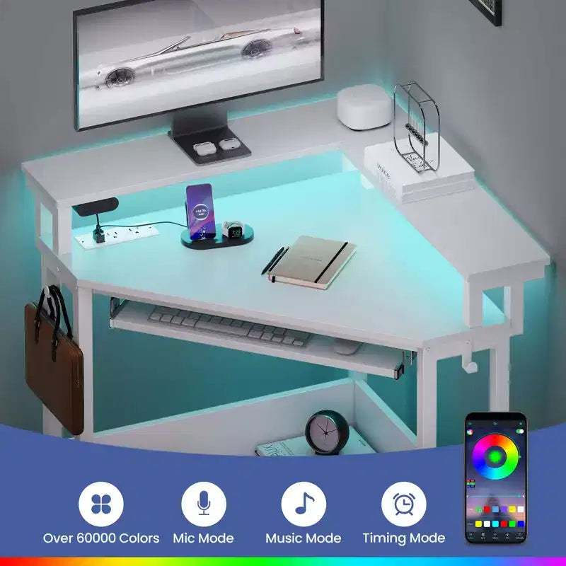 Escritorio esquinero pequeño Greenstell para computadora con toma de corriente, escritorio para computadora con luz LED, soporte para monitor, bandeja para teclado y soporte para auriculares
