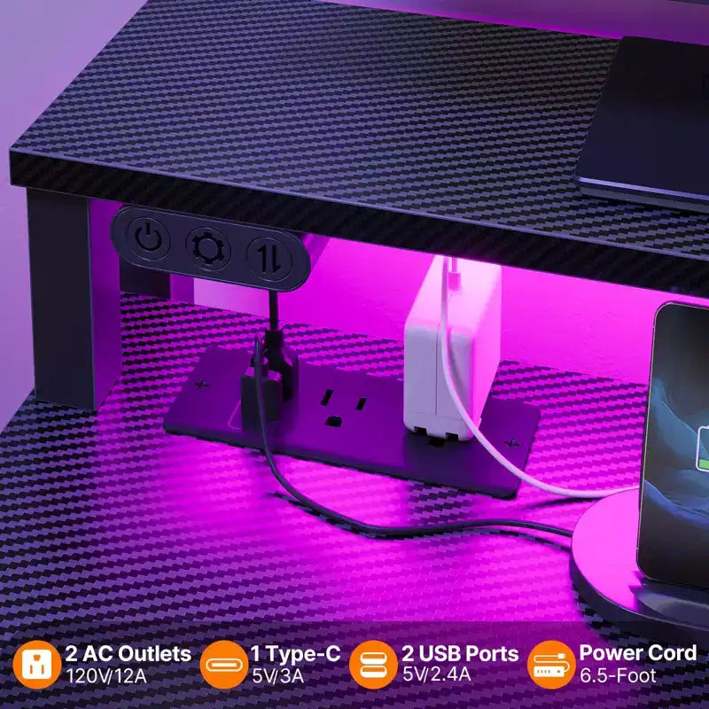 Escritorio esquinero pequeño Greenstell para computadora con toma de corriente, escritorio para computadora con luz LED, soporte para monitor, bandeja para teclado y soporte para auriculares