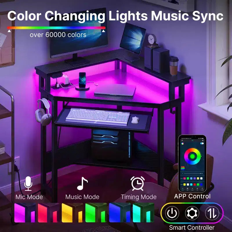 Escritorio esquinero pequeño Greenstell para computadora con toma de corriente, escritorio para computadora con luz LED, soporte para monitor, bandeja para teclado y soporte para auriculares