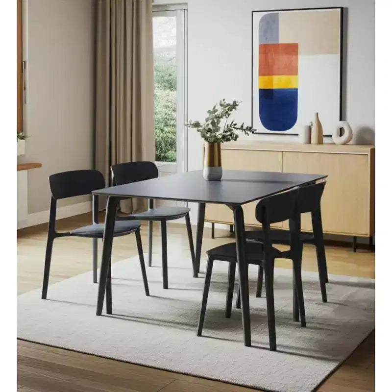 HomeRoots Juego de cuatro sillas laterales de comedor de plástico resistente gris