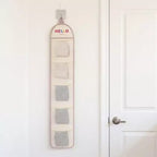 Organizador de pared colgante con múltiples bolsillos de malla y diseño estampado HELLO
