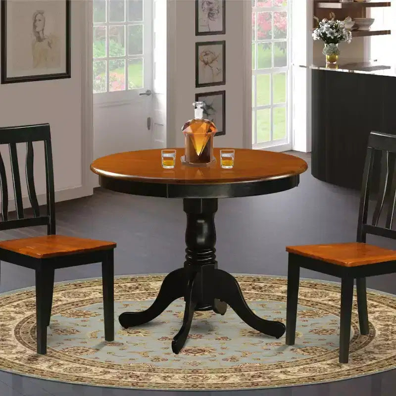 Mesa de comedor redonda de 3 piezas con tablero de madera maciza en acabado negro y 2 sillas con
