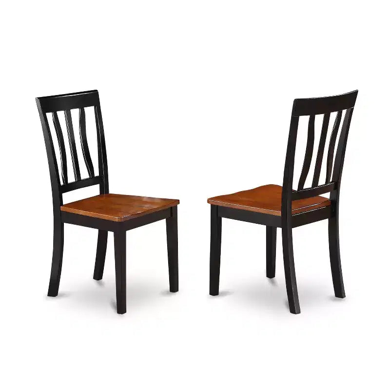 Mesa de comedor redonda de 3 piezas con tablero de madera maciza en acabado negro y 2 sillas con