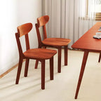Silla de comedor de madera maciza con respaldo curvo y estructura de madera de caucho