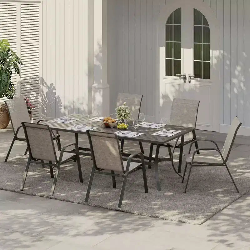 Juego de 4 sillas de comedor apilables que ahorran espacio para patio | Sillas de exterior de respaldo alto con tela de textileno transpirable | Marco de metal duradero, ideales para el césped