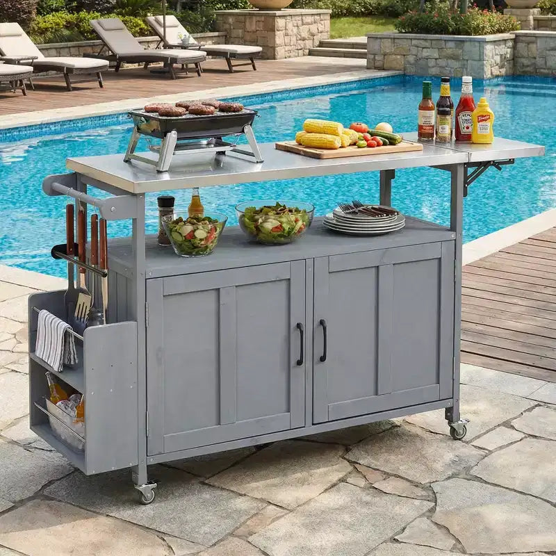 Isla de cocina exterior plegable GDFStudio Mavis con ruedas bloqueables