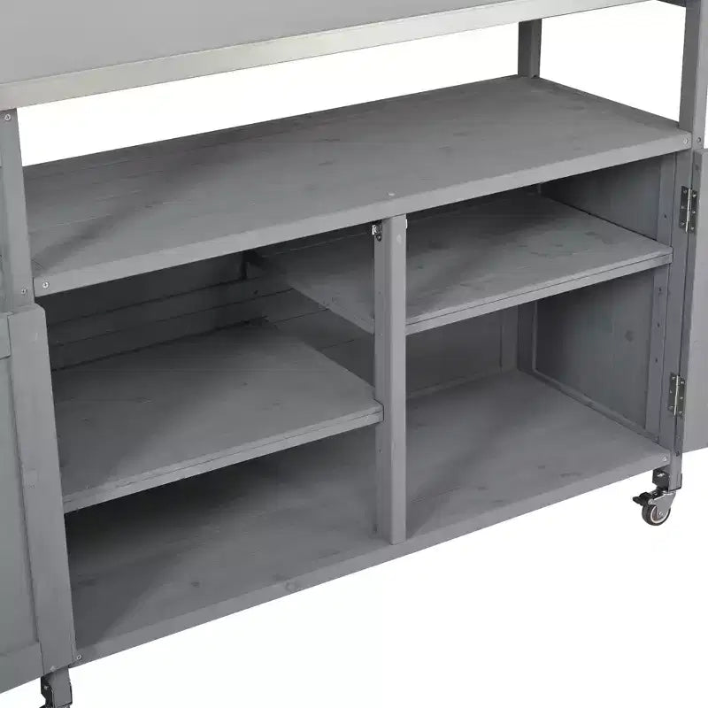 Isla de cocina exterior plegable GDFStudio Mavis con ruedas bloqueables