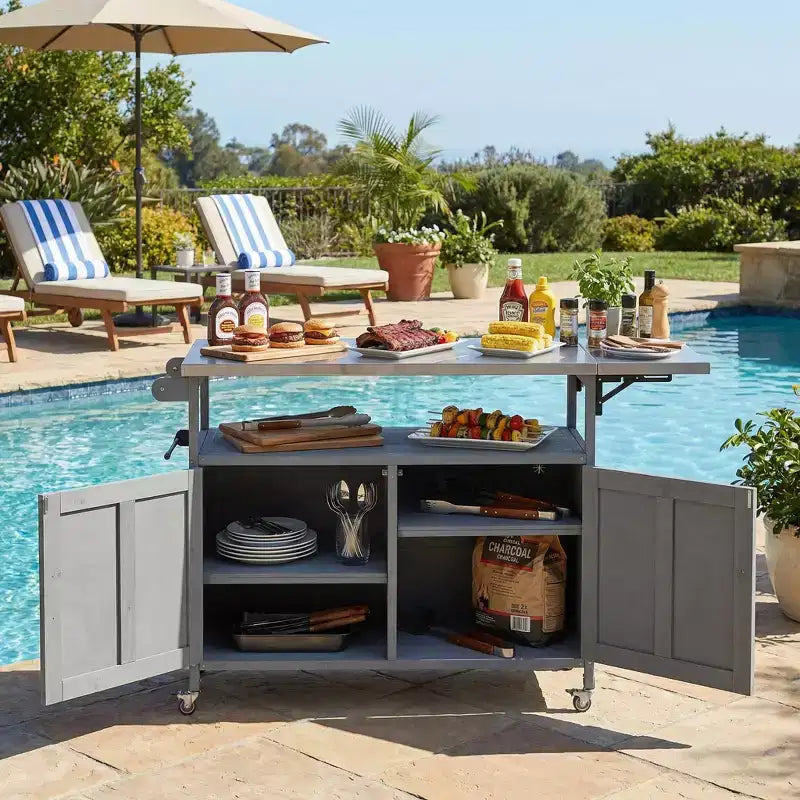 Isla de cocina exterior plegable GDFStudio Mavis con ruedas bloqueables