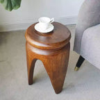 Mesa auxiliar redonda GDFStudio Arashi de madera de paulownia tallada