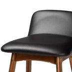 Baxton Studio 2 taburetes Darrin de piel sintética y madera negro/nogal/marrón: Asiento ovalado tapizado, altura fija de 76,2 cm