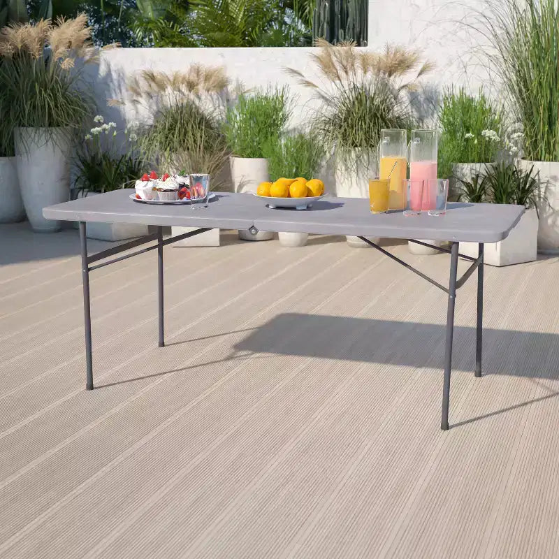 Mesa plegable de banquete y eventos de plástico de 6 pies con doble pliegue y asa de transporte Flash Furniture
