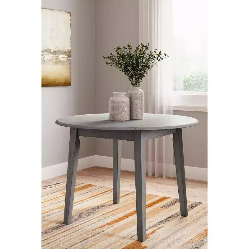 Mesa de comedor de hojas abatibles Casual Shullden de Signature Design by Ashley, color gris