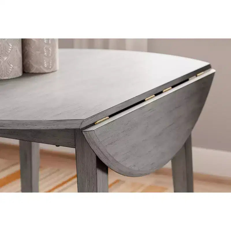 Mesa de comedor de hojas abatibles Casual Shullden de Signature Design by Ashley, color gris